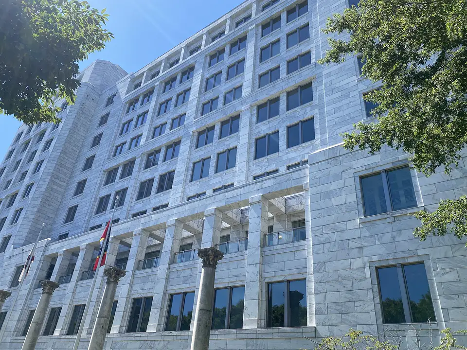The Federal Reserve Bank of Atlanta headquarters, a modern glass and stone building