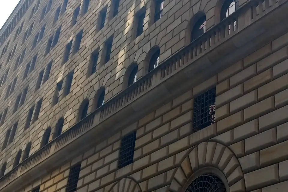 The stone facade of the Federal Reserve Bank of New York